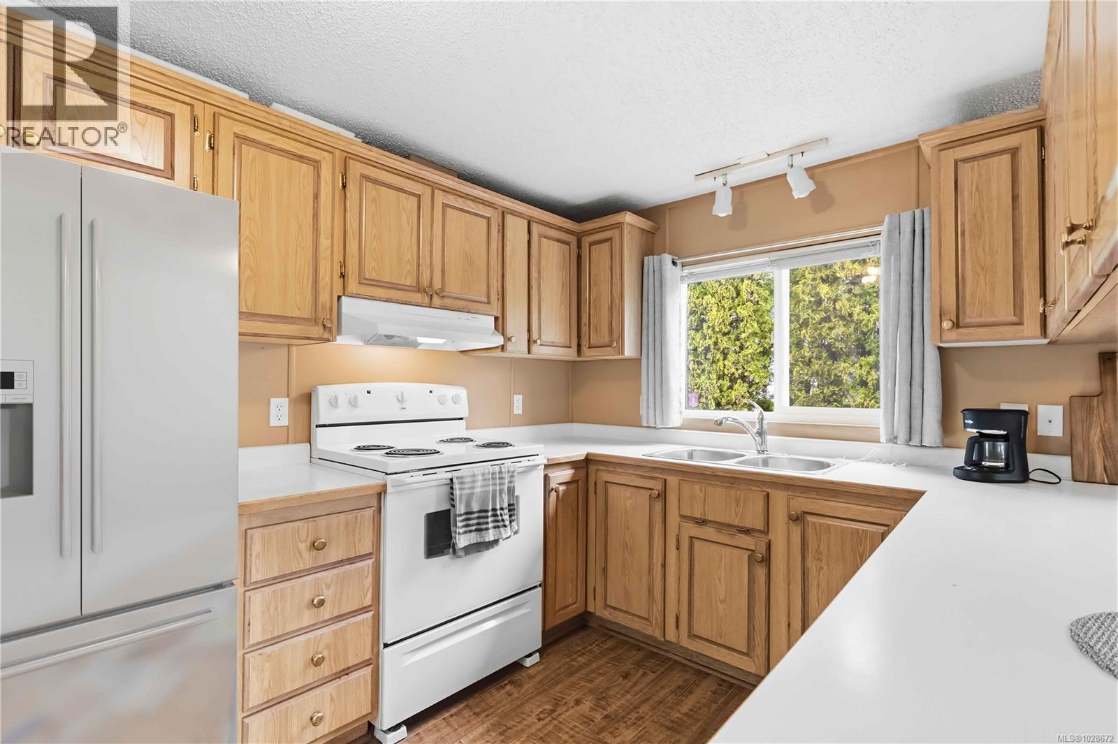 #24 7021 GRANT RD W - 13