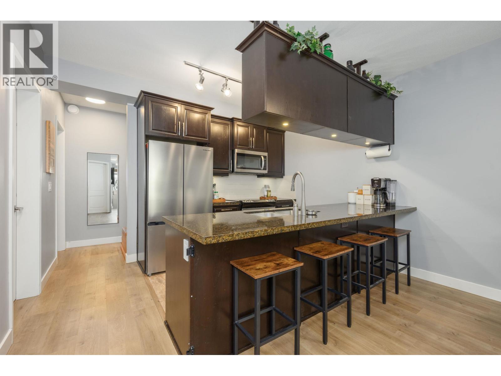 115 11887 BURNETT Street - main photo