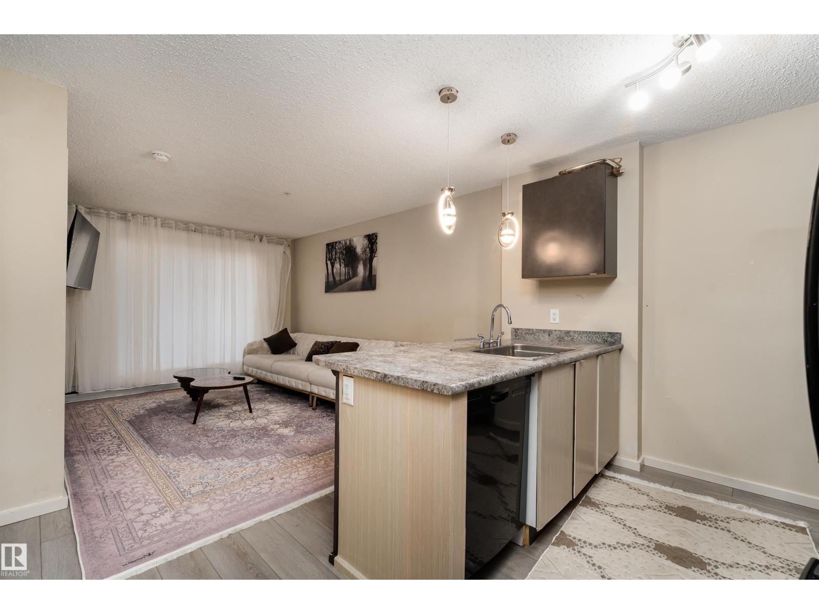 
          205 340 WINDERMERE Road NW
            <br/>
            <span>Edmonton</span>
            , 
            <span>AB</span>
             <span>T6W2P2</span>
         - Photo 22