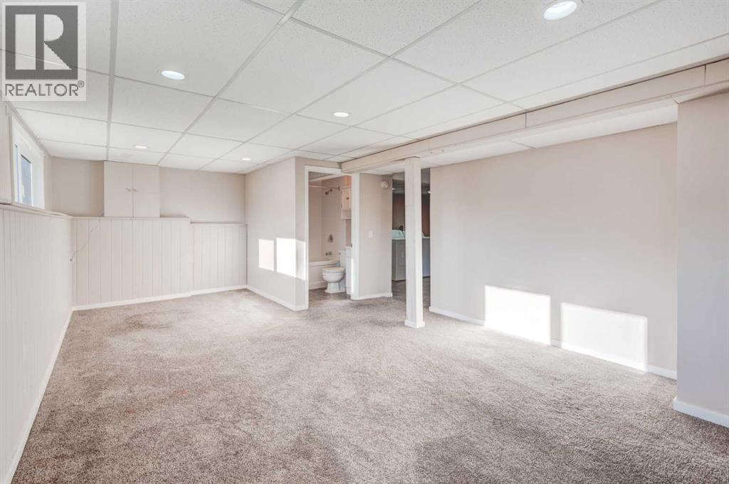 Single Family House Bi-level for Sale in  Midridge Gardens SE Midnapore Calgary 