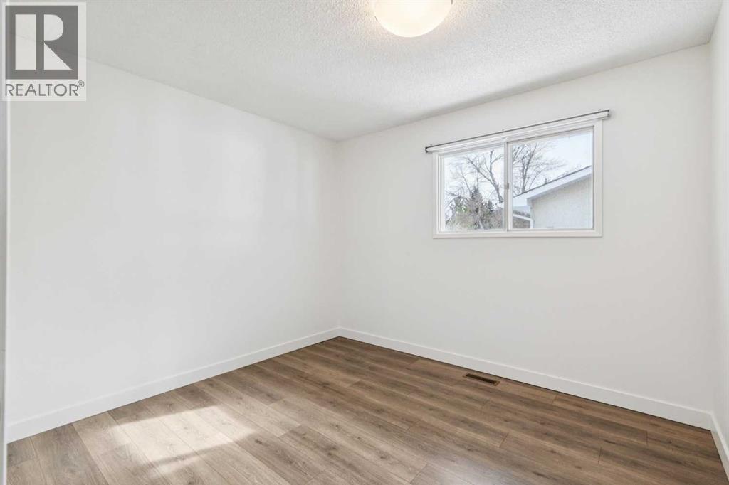 Single Family House Bi-level for Sale in  Braton Place SW Braeside Calgary 