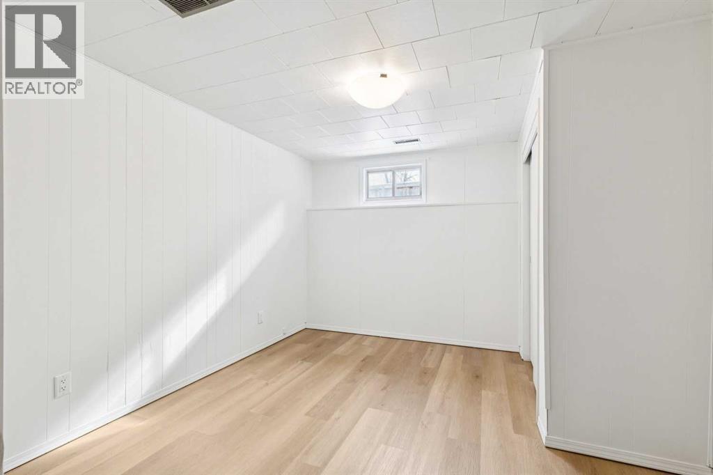 Single Family House Bi-level for Sale in  Braton Place SW Braeside Calgary 