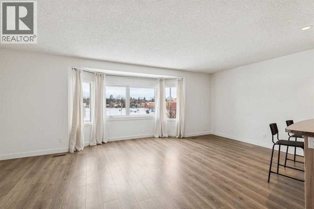 Single Family House Bi-level for Sale in  Braton Place SW Braeside Calgary 