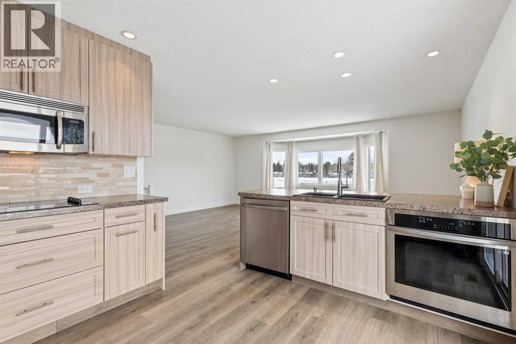 Single Family House Bi-level for Sale in  Braton Place SW Braeside Calgary 