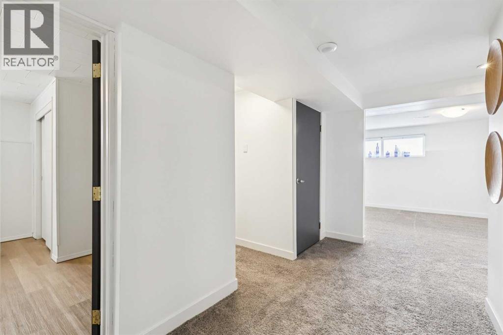 Single Family House Bi-level for Sale in  Braton Place SW Braeside Calgary 