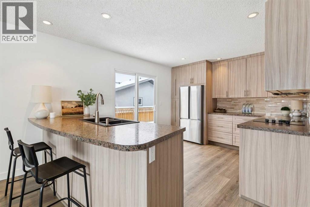 Single Family House Bi-level for Sale in  Braton Place SW Braeside Calgary 