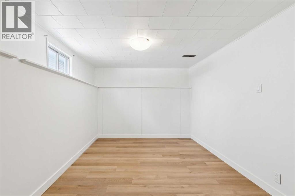 Single Family House Bi-level for Sale in  Braton Place SW Braeside Calgary 