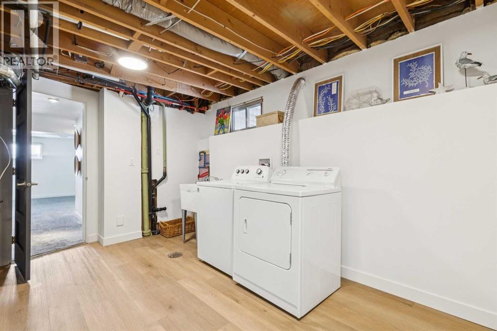 Single Family House Bi-level for Sale in  Braton Place SW Braeside Calgary 