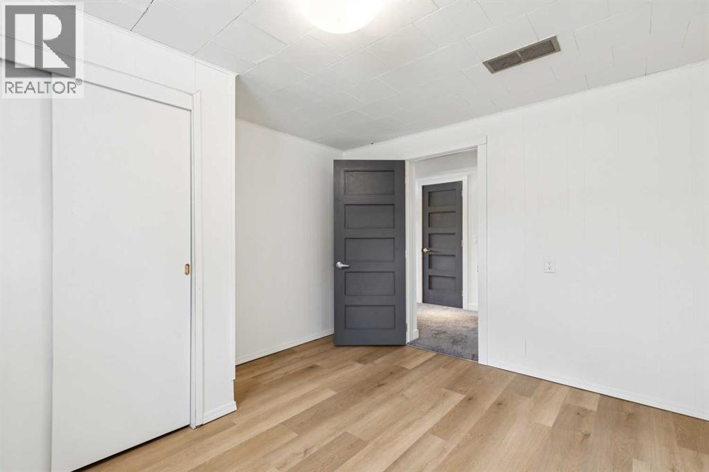 Single Family House Bi-level for Sale in  Braton Place SW Braeside Calgary 