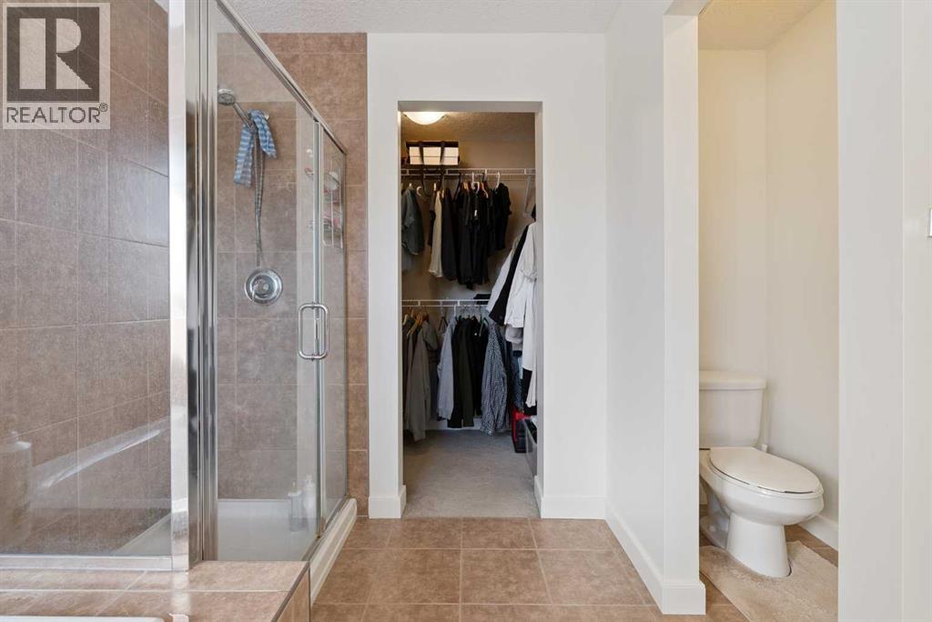 Single Family House for Sale in  Everbrook Crescent SW Evergreen Calgary 