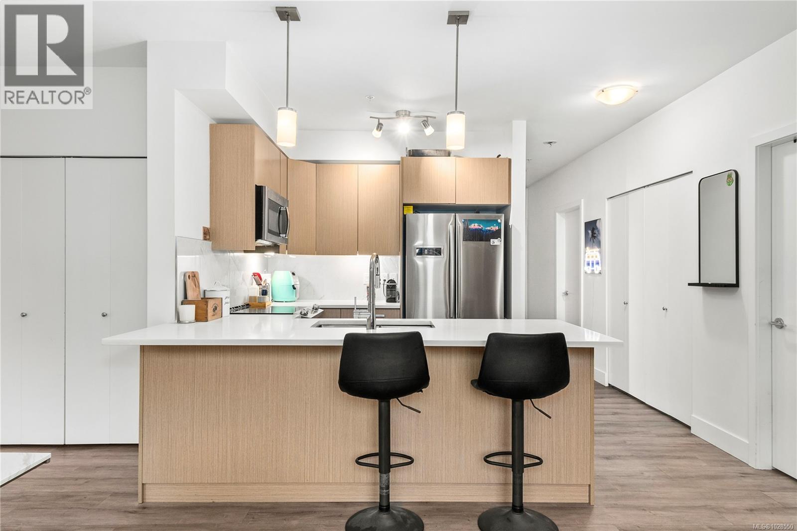 #102 3070 Kilpatrick Ave - 1