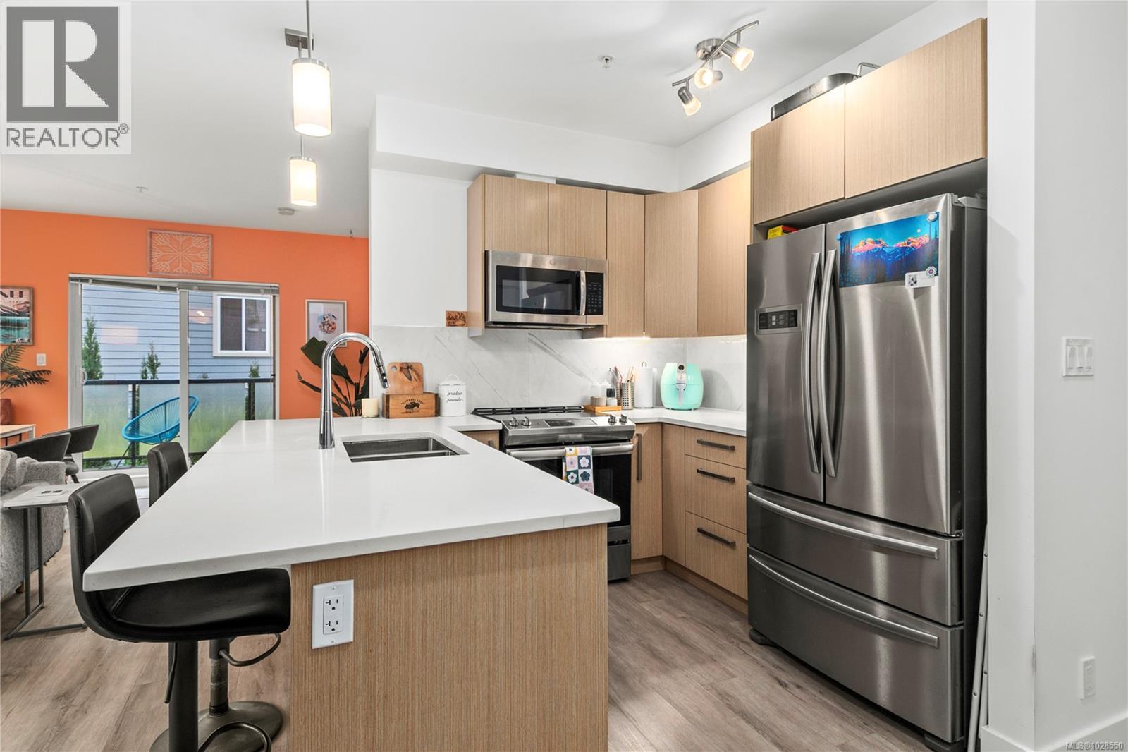 #102 3070 Kilpatrick Ave - 4