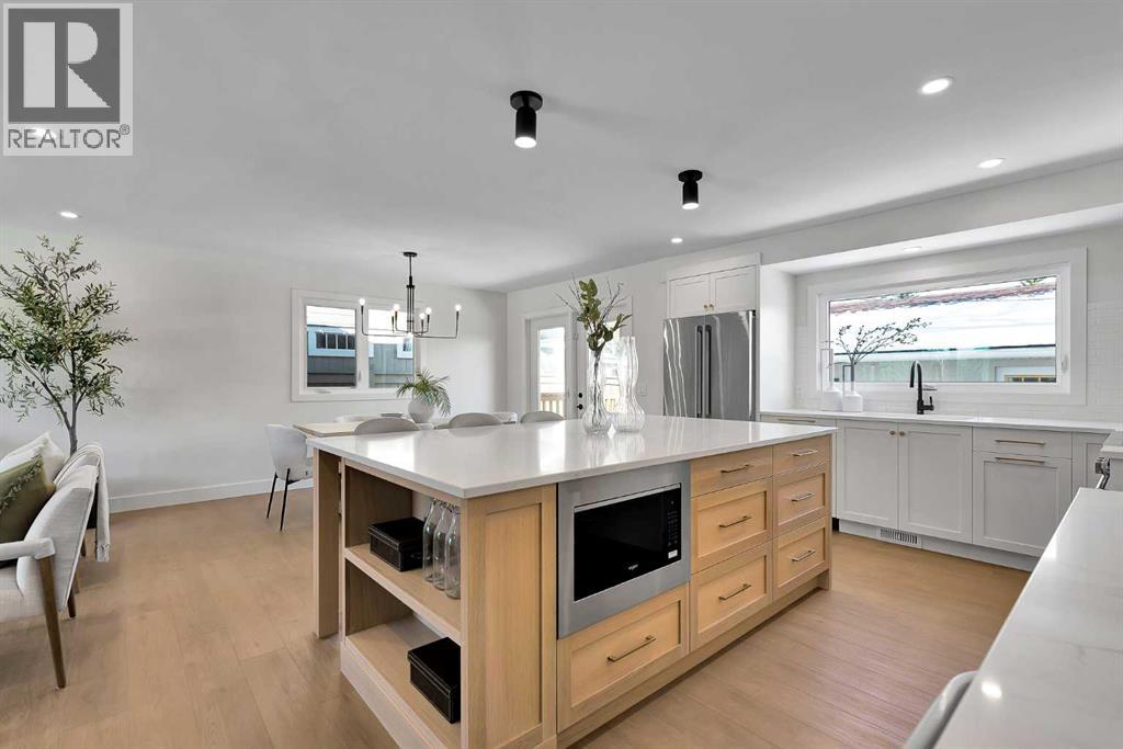 Single Family House 4 Level for Sale in  Lake Twintree Crescent SE Lake Bonavista Calgary 