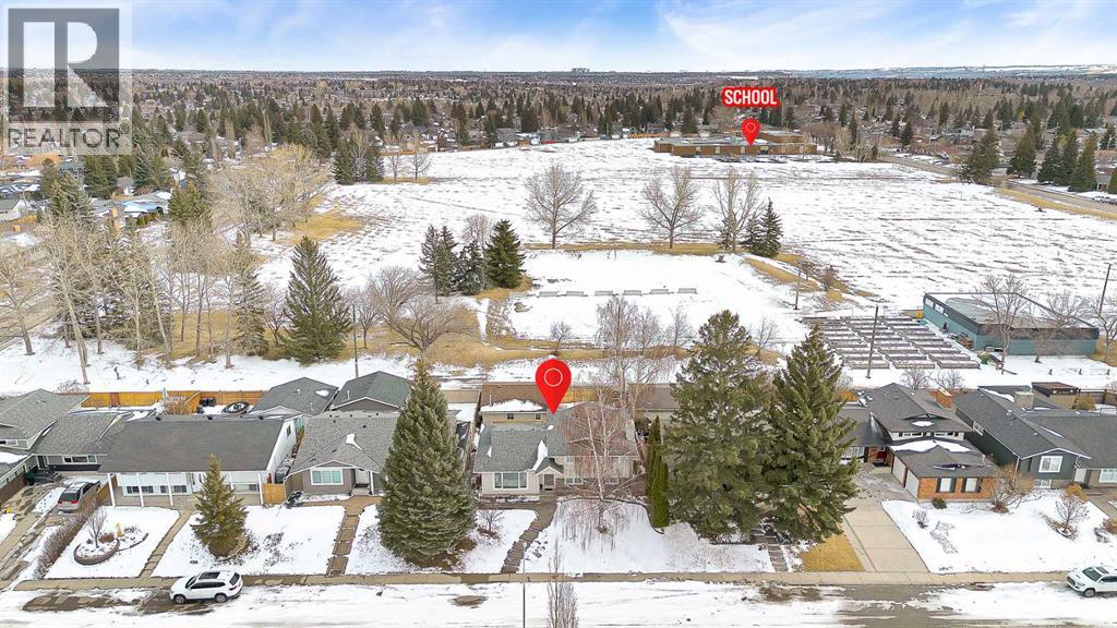 Single Family House 4 Level for Sale in  Lake Twintree Crescent SE Lake Bonavista Calgary 
