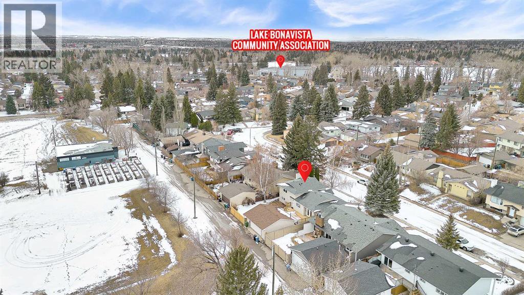 Single Family House 4 Level for Sale in  Lake Twintree Crescent SE Lake Bonavista Calgary 