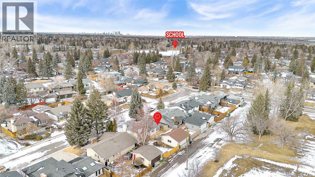 Single Family House 4 Level for Sale in  Lake Twintree Crescent SE Lake Bonavista Calgary 