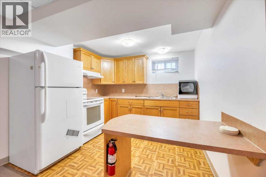 Multi-family House Bungalow for Sale in  Kingsmere Crescent SW Kingsland Calgary 