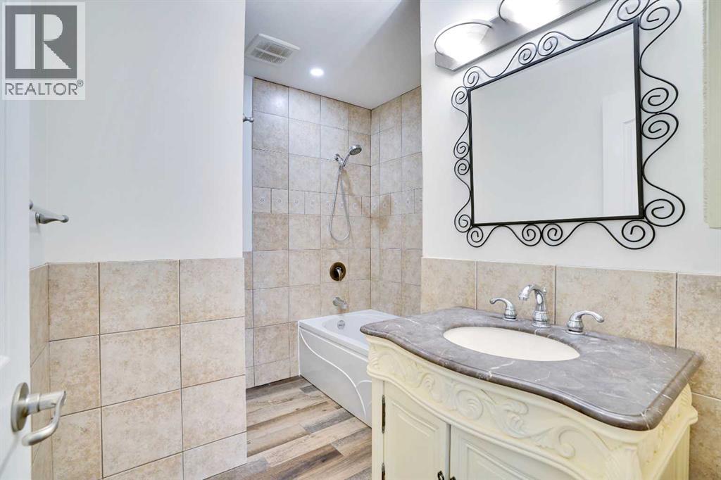 Single Family House 4 Level for Sale in  Coach Manor Rise SW Coach Hill Calgary 