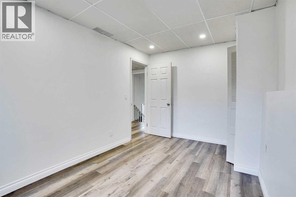 Single Family House 4 Level for Sale in  Coach Manor Rise SW Coach Hill Calgary 