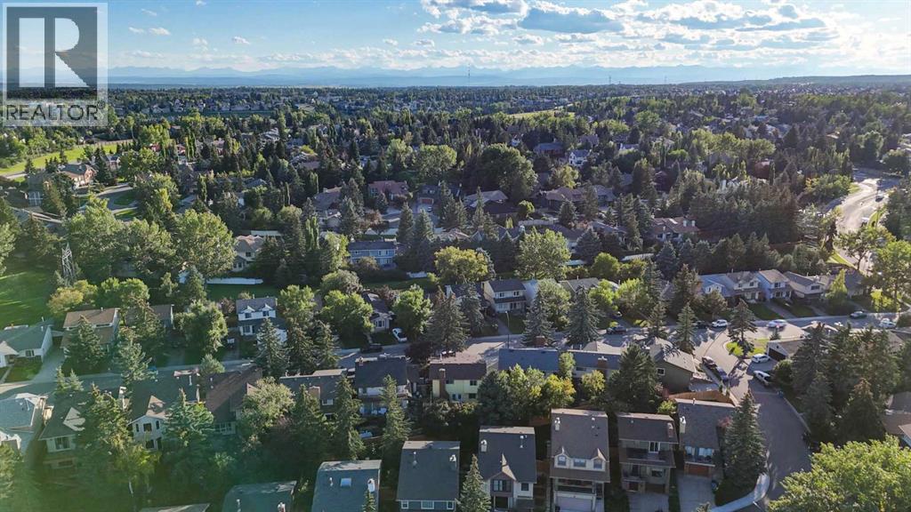 Single Family House 4 Level for Sale in  Coach Manor Rise SW Coach Hill Calgary 