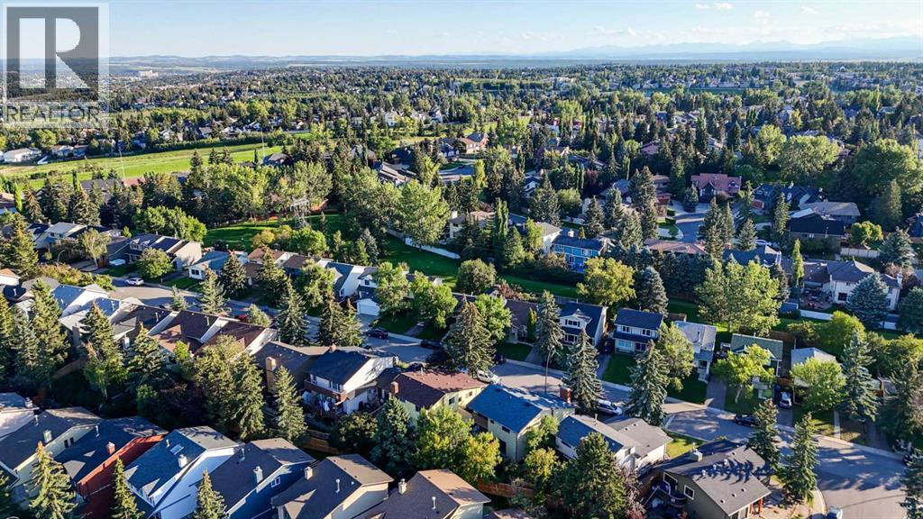 Single Family House 4 Level for Sale in  Coach Manor Rise SW Coach Hill Calgary 