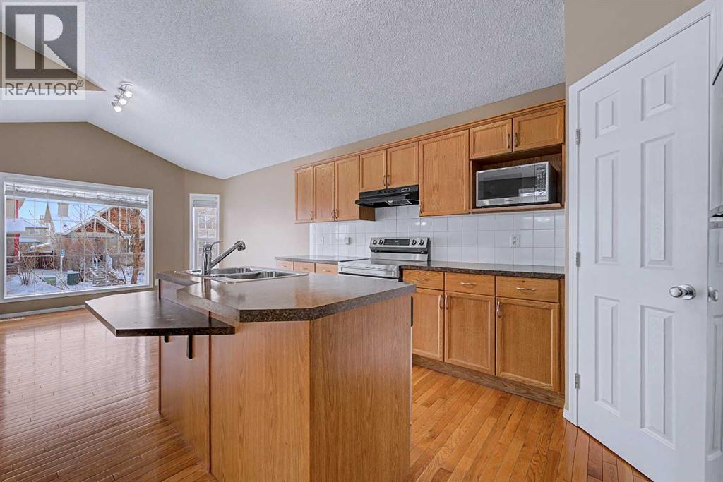 Single Family House 4 Level for Sale in  Evermeadow Road SW Evergreen Calgary 