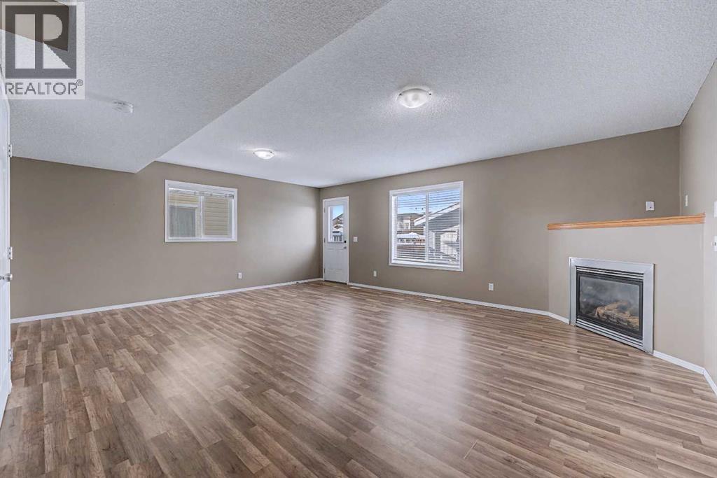Single Family House 4 Level for Sale in  Evermeadow Road SW Evergreen Calgary 