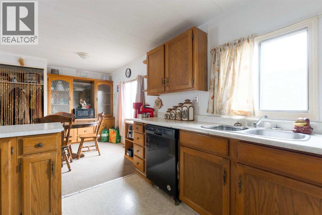 Single Family House Mobile Home for Sale in    Avenue SE Red Carpet Calgary 