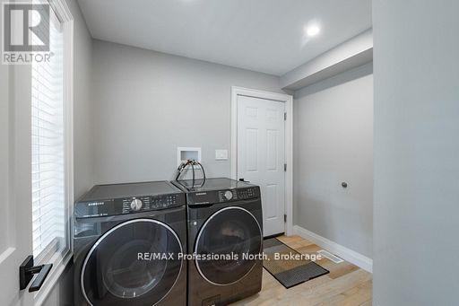 Laundry leads to Attached Garage
