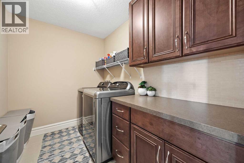 Single Family House for Sale in  Ascot Rise SW Aspen Woods Calgary 