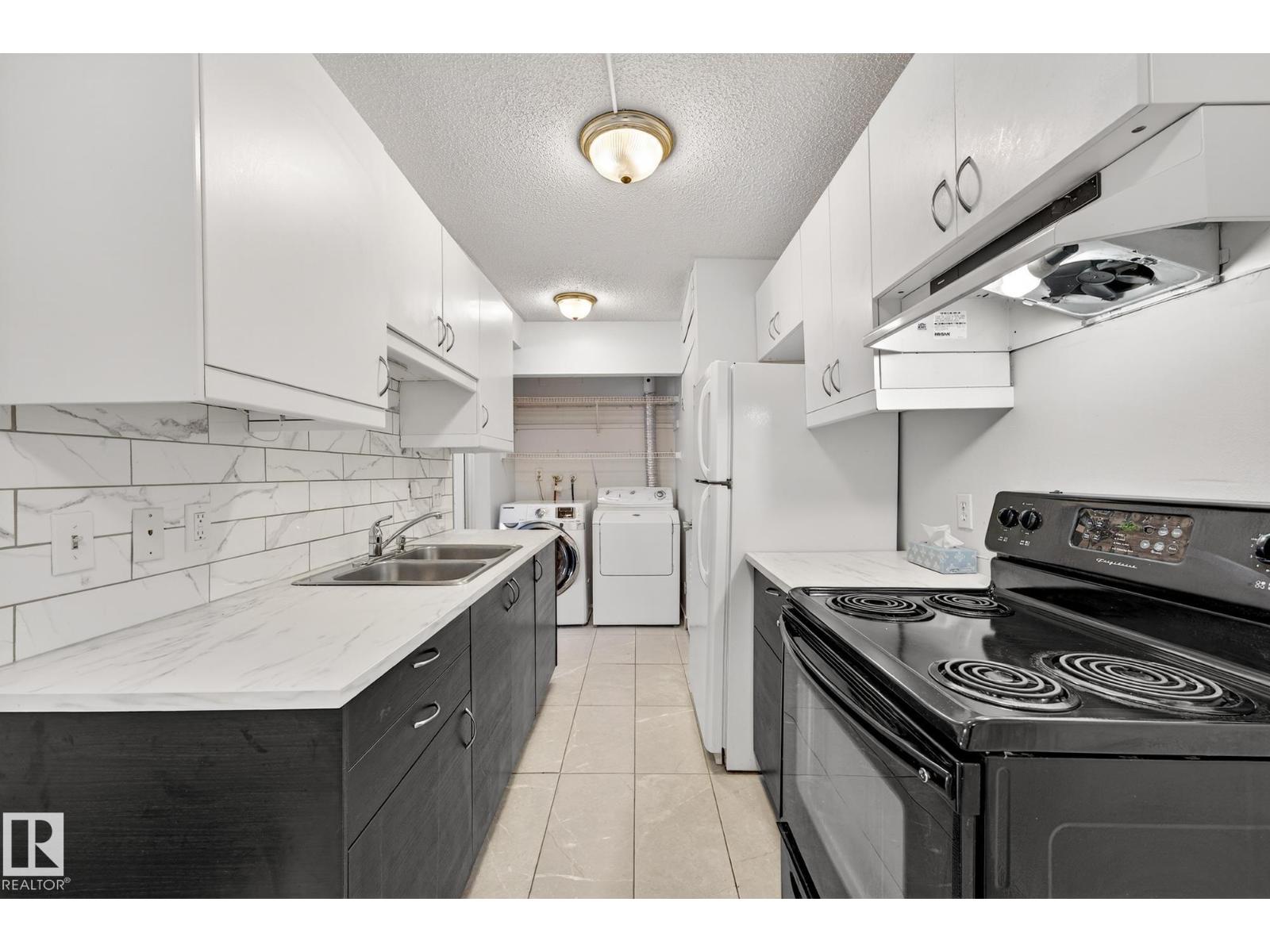 
          1414 LAKEWOOD RD W NW
            <br/>
            <span>Edmonton</span>
            , 
            <span>AB</span>
             <span>T6K3M2</span>
         - Photo 18