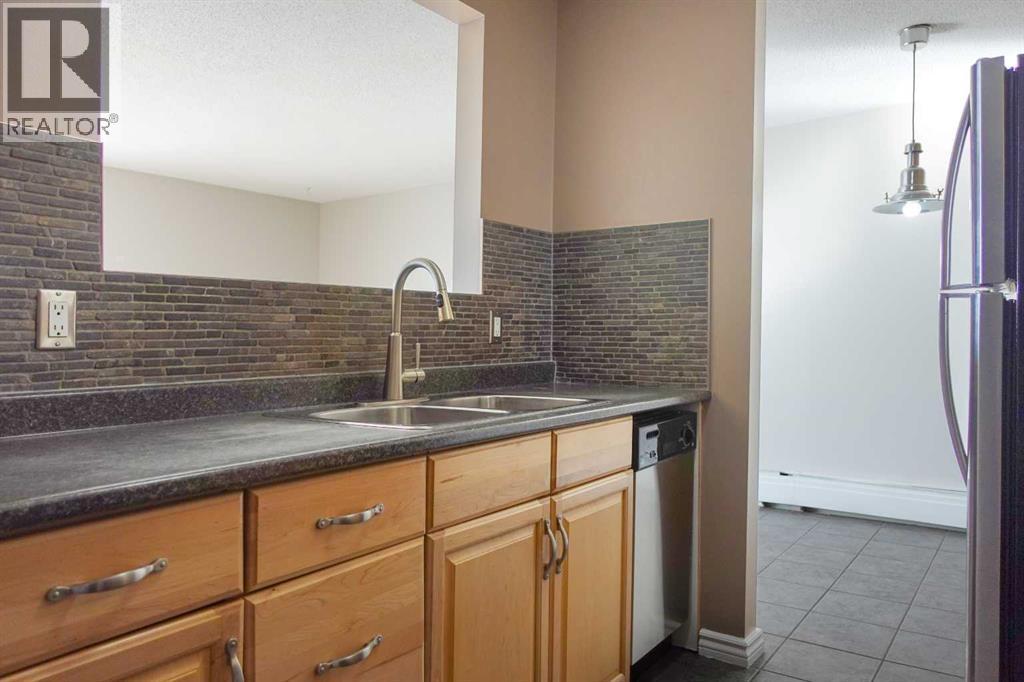 Single Family House for Sale in    Avenue Mountview Grande Prairie 