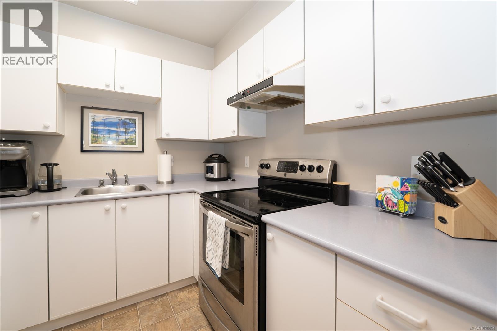 #301 331 BURNSIDE RD E - 15