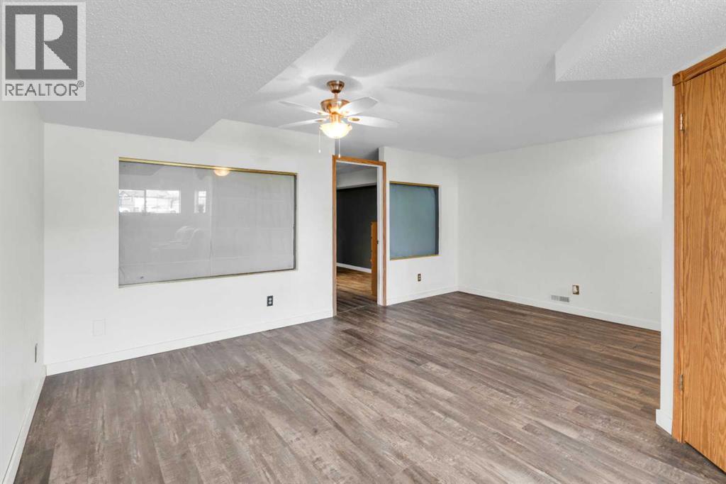 Single Family House Bi-level for Sale in  Laguna Way NE Monterey Park Calgary 