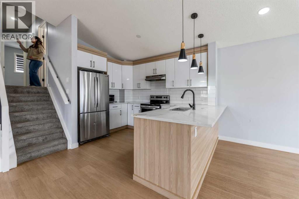 Single Family House 4 Level for Sale in  Martin Crossing Grove NE Martindale Calgary 