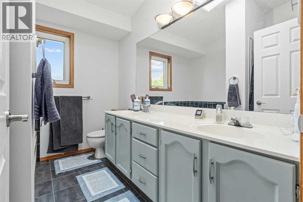 Single Family House for Sale in  Arbour Wood Close NW Arbour Lake Calgary 