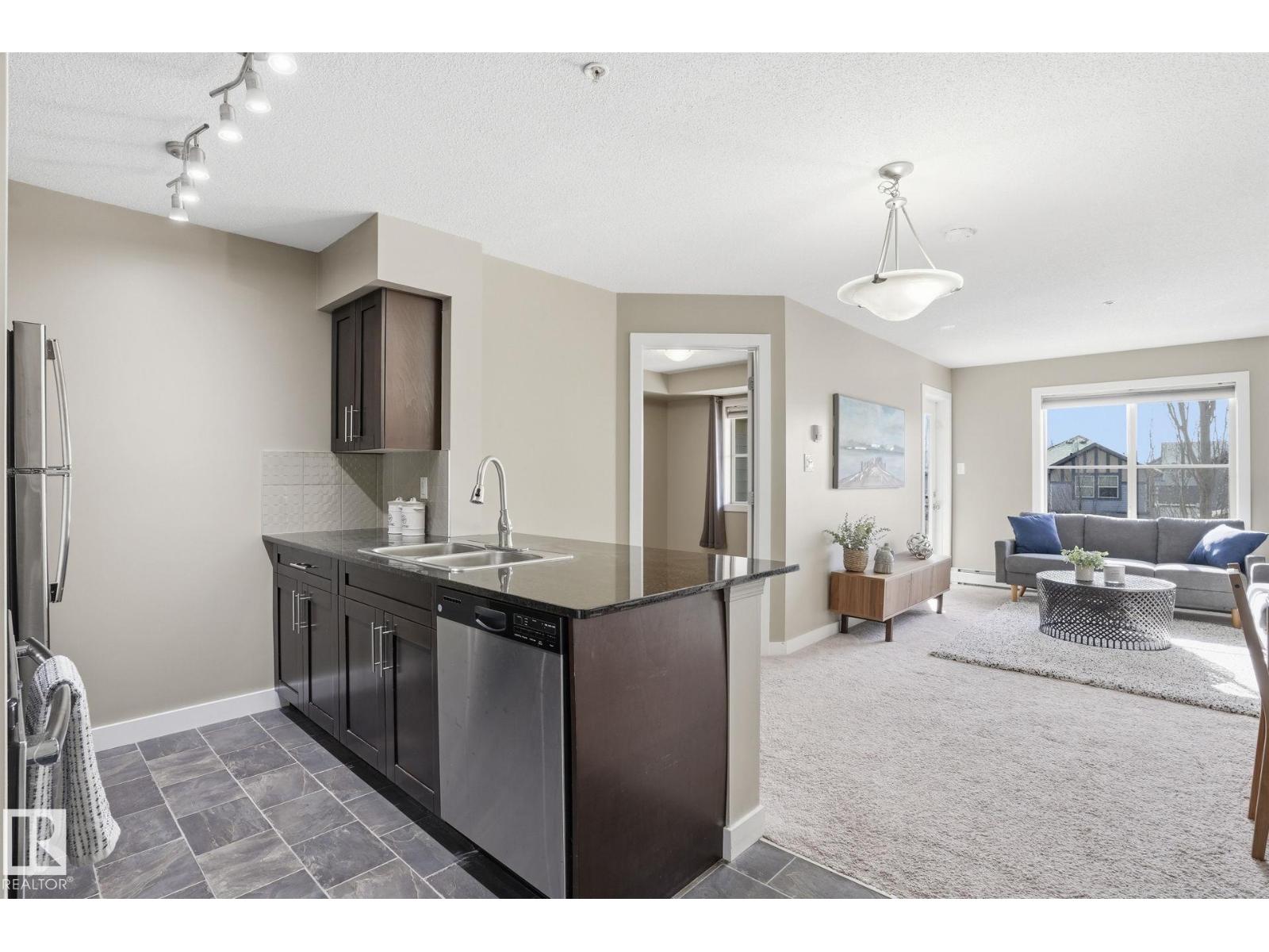 
          213 270 MCCONACHIE Drive NW
            <br/>
            <span>Edmonton</span>
            , 
            <span>AB</span>
             <span>T5Y3N4</span>
         - Photo 33