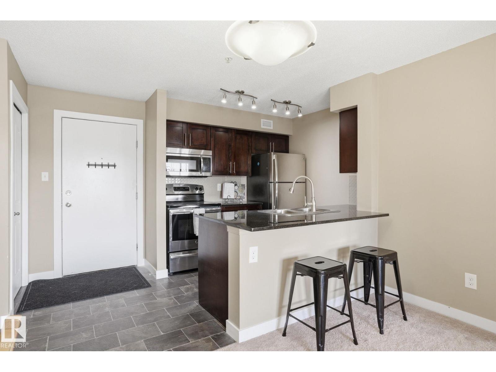 
          213 270 MCCONACHIE Drive NW
            <br/>
            <span>Edmonton</span>
            , 
            <span>AB</span>
             <span>T5Y3N4</span>
         - Photo 15