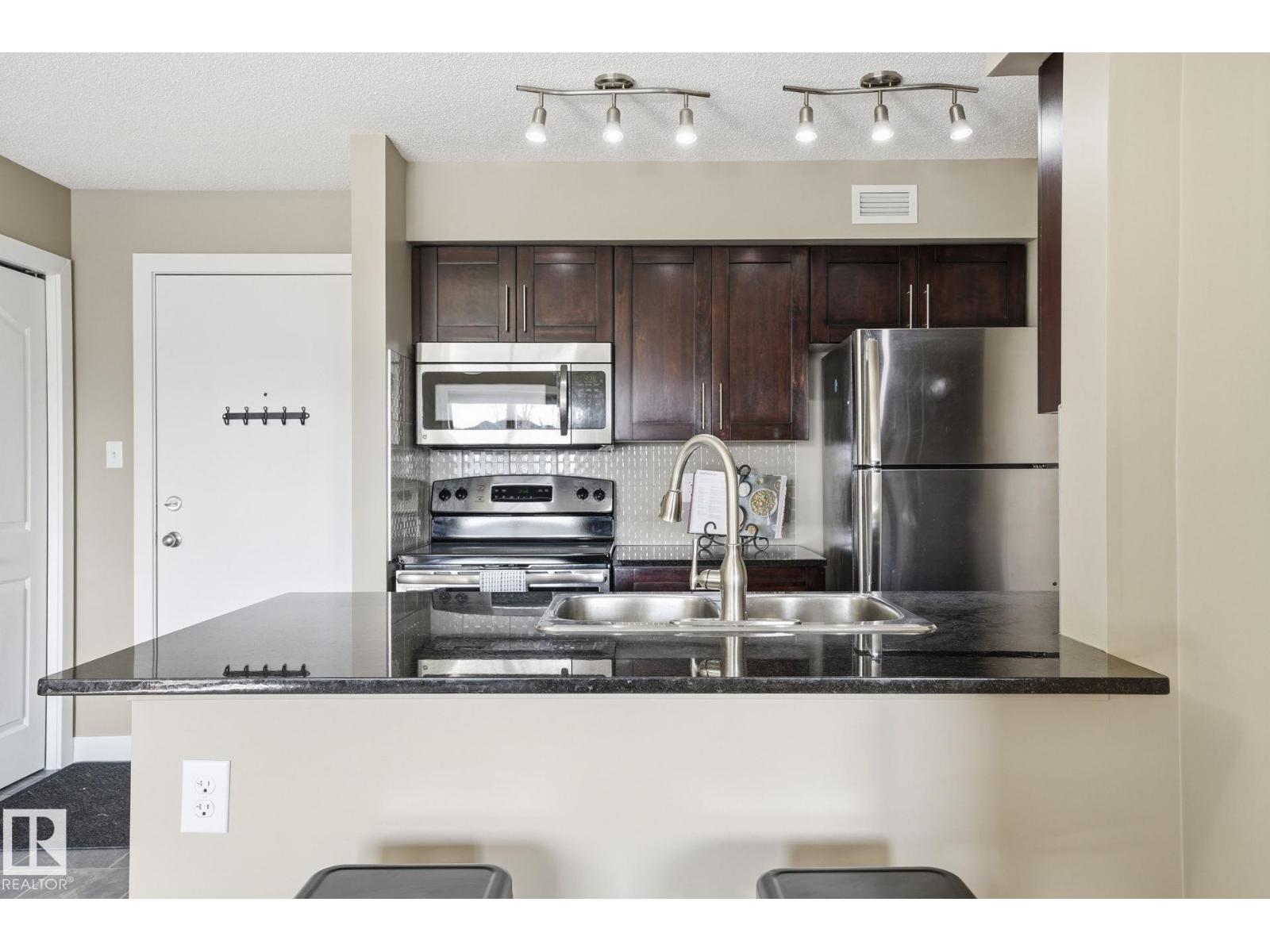 
          213 270 MCCONACHIE Drive NW
            <br/>
            <span>Edmonton</span>
            , 
            <span>AB</span>
             <span>T5Y3N4</span>
         - Photo 23