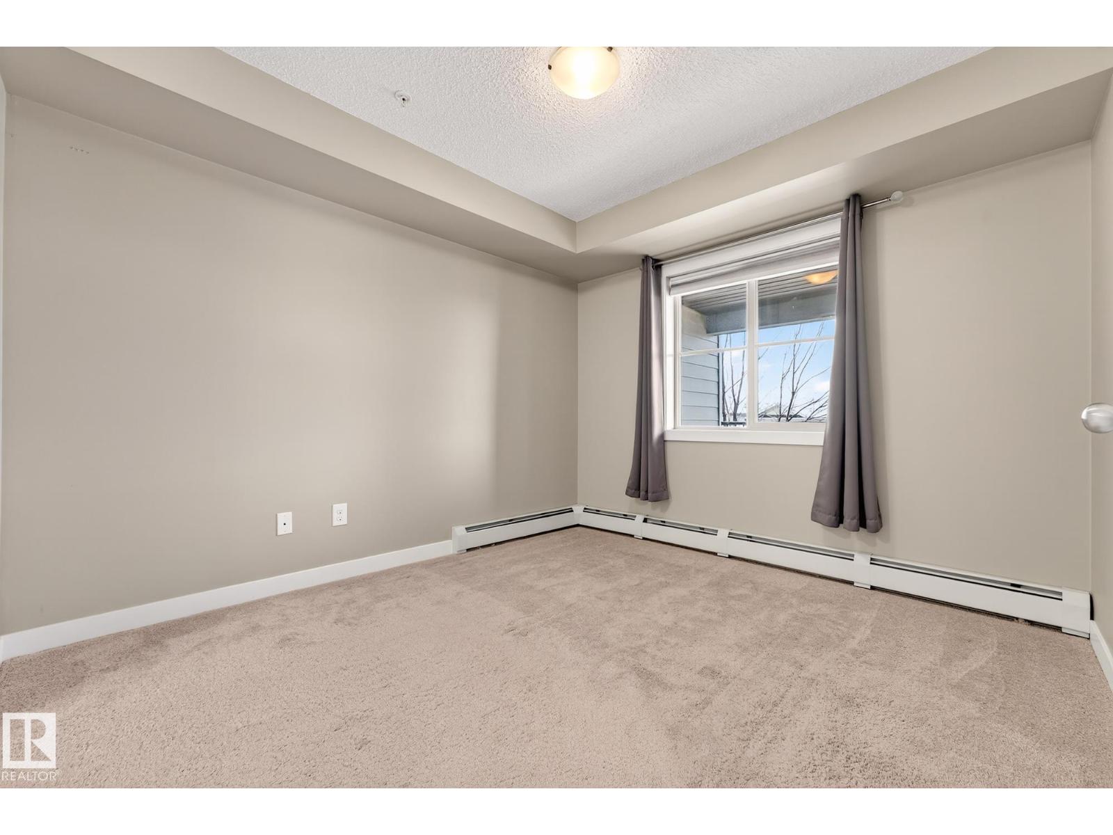 
          213 270 MCCONACHIE Drive NW
            <br/>
            <span>Edmonton</span>
            , 
            <span>AB</span>
             <span>T5Y3N4</span>
         - Photo 8