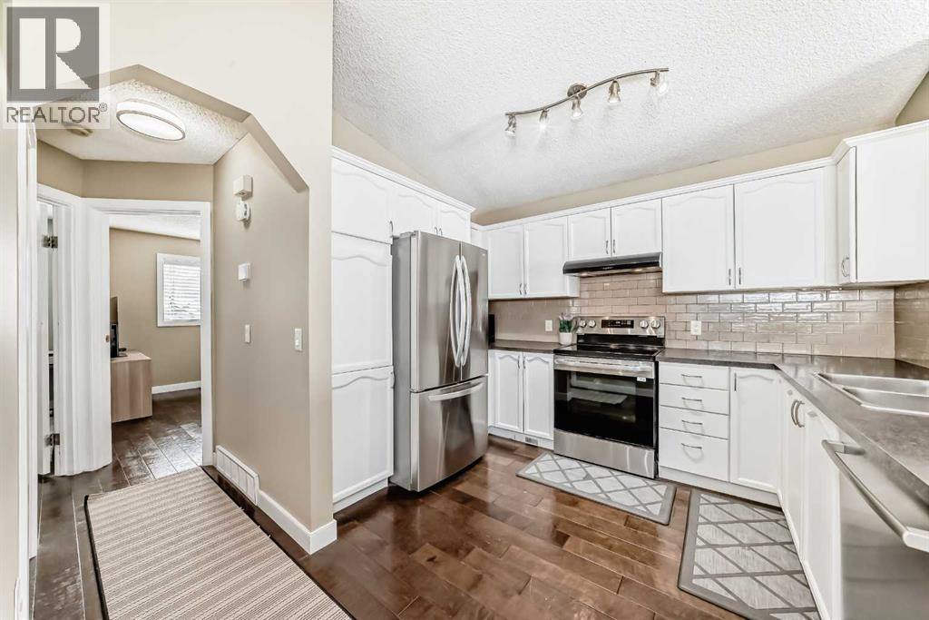 Single Family House Bi-level for Sale in  Bridleglen Manor SW Bridlewood Calgary 