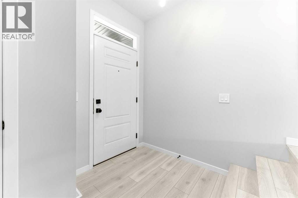 Single Family House for Sale in  Belmont Heath SW Belmont Calgary 