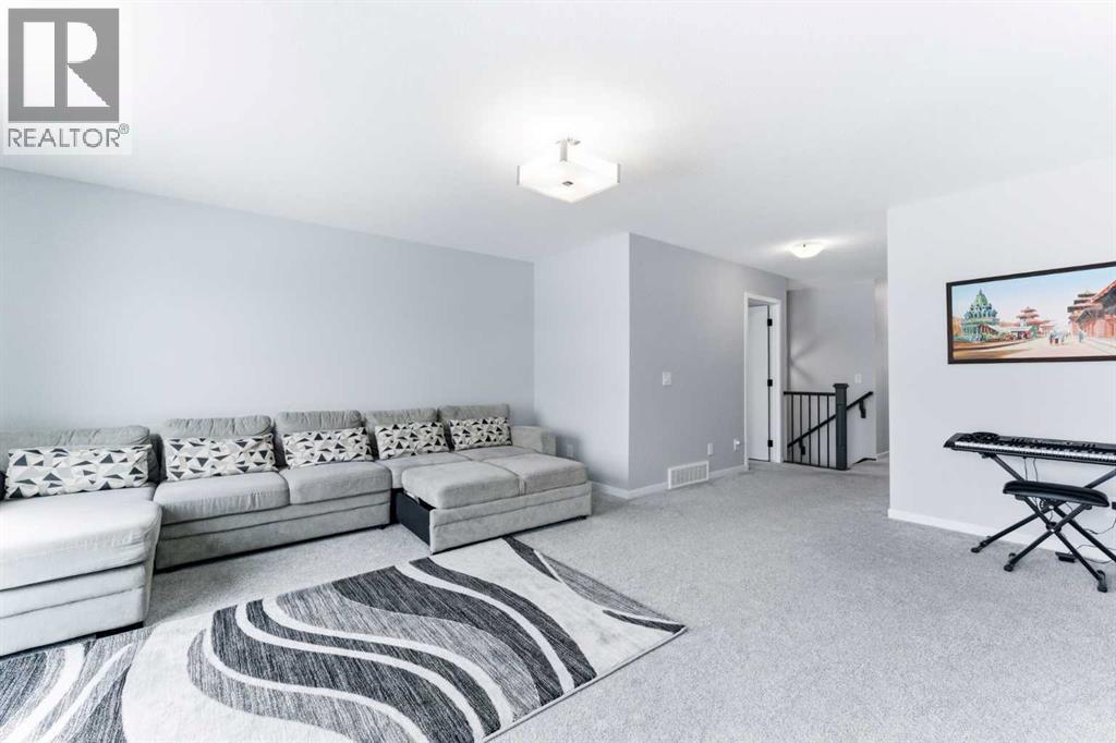 Single Family House for Sale in  Belmont Heath SW Belmont Calgary 