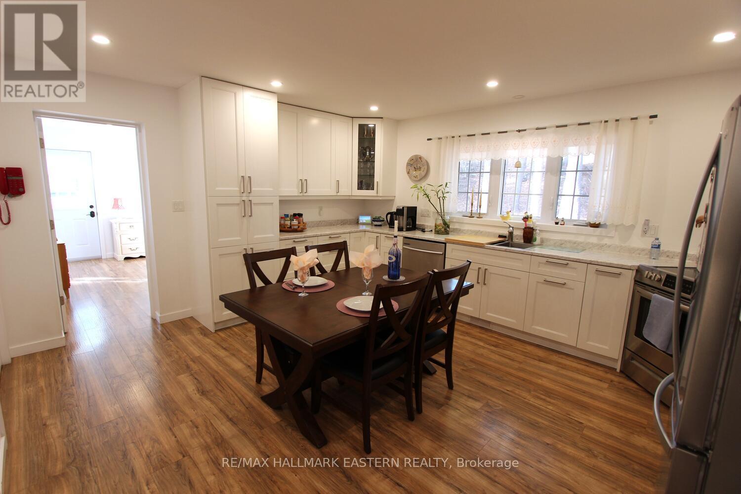 Main floor suite off kitchen.