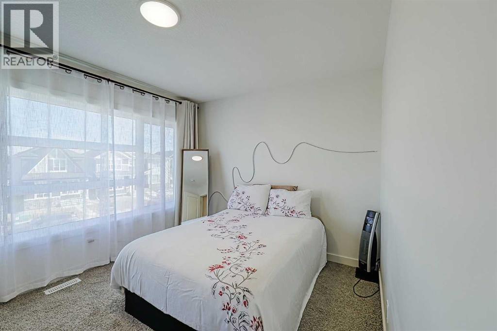 Single Family House for Sale in  Belmont Green SW Belmont Calgary 