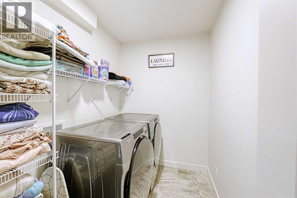 Single Family House for Sale in  Belmont Green SW Belmont Calgary 