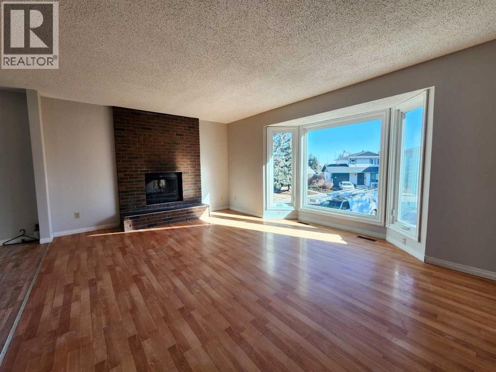 Single Family House Bi-level for Sale in  Bermondsey Court NW Beddington Heights Calgary 