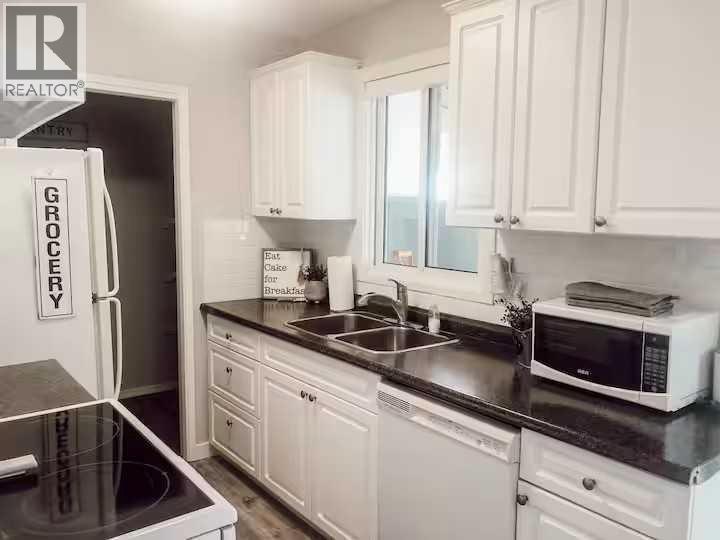 Multi-family House Bi-level for Sale in   Street S Glendale Lethbridge 