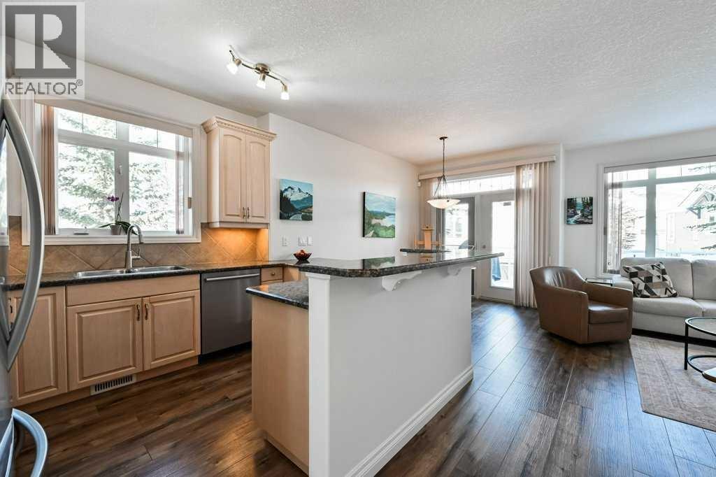 Single Family House Bi-level for Sale in  Discovery Woods Villas SW Discovery Ridge Calgary 
