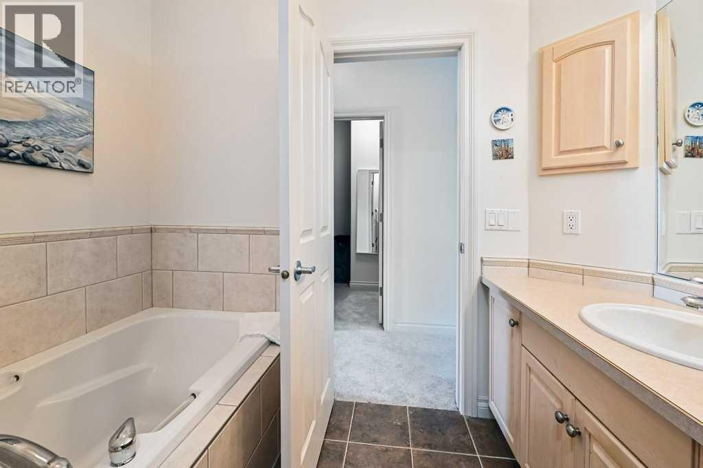 Single Family House Bi-level for Sale in  Discovery Woods Villas SW Discovery Ridge Calgary 